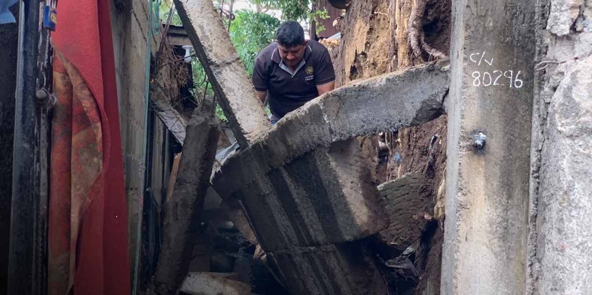 Colapsa muro en barrio capitalino, pero familia sale ilesa